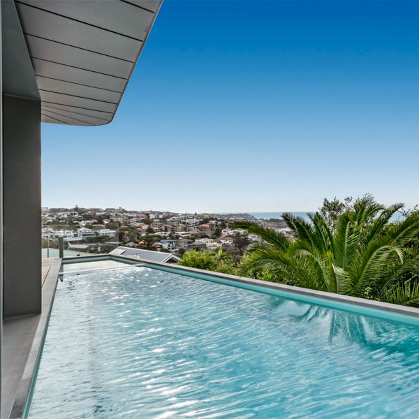 custom pool and spa with sea view, by Trademark Pools