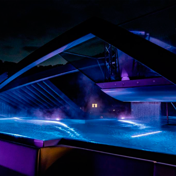 steel pool and spa at night