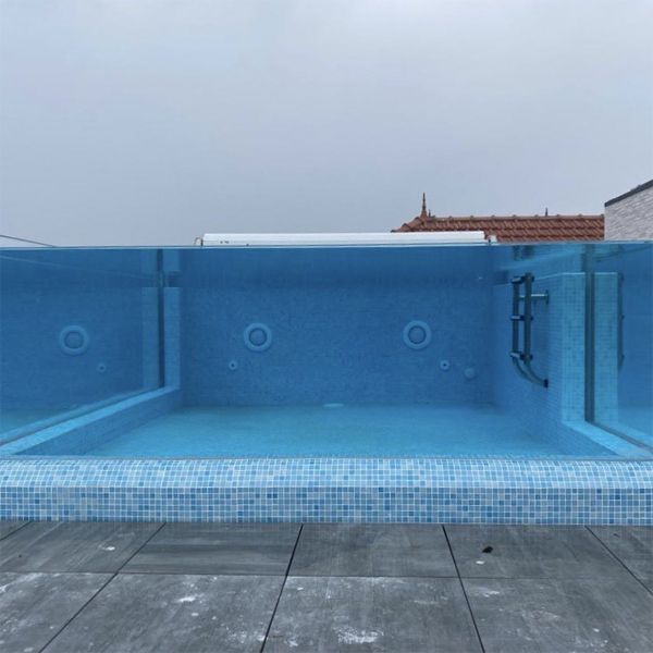 Transparent infinity mini pool on the rooftop of a hotel, built above ground, by Aquadec