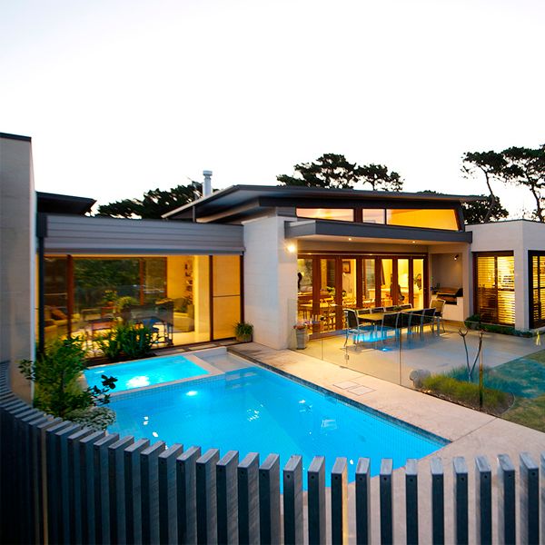 white custom pool with spa, by Icon Pools