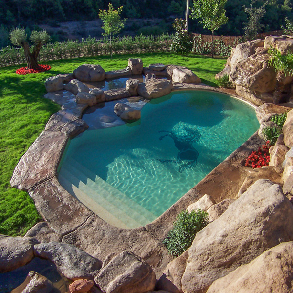 private pool surrounded by stones
