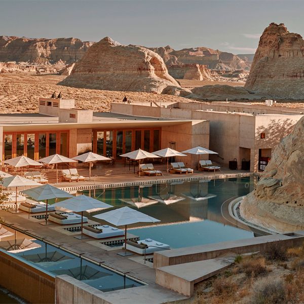 drone view of an impressive infinity pool at Amangiri hotel, surrounded by rocks in the middle of the desert, in a project by Wendell Burnette Architects