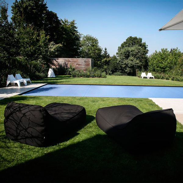 black overflow pool and automatic pool cover by LDX Pools