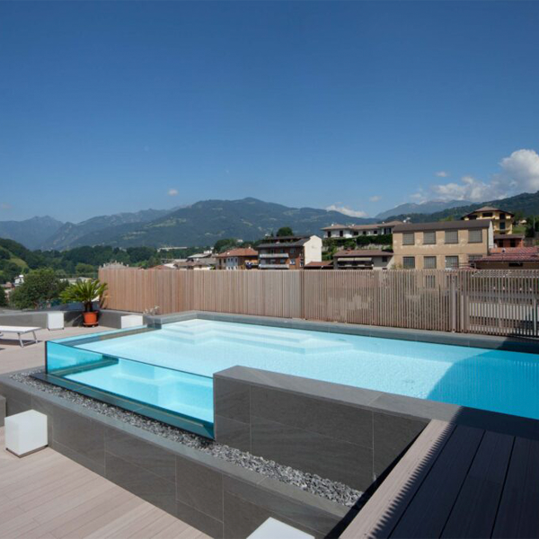 above ground transparent infinity pool by Teknopiscine