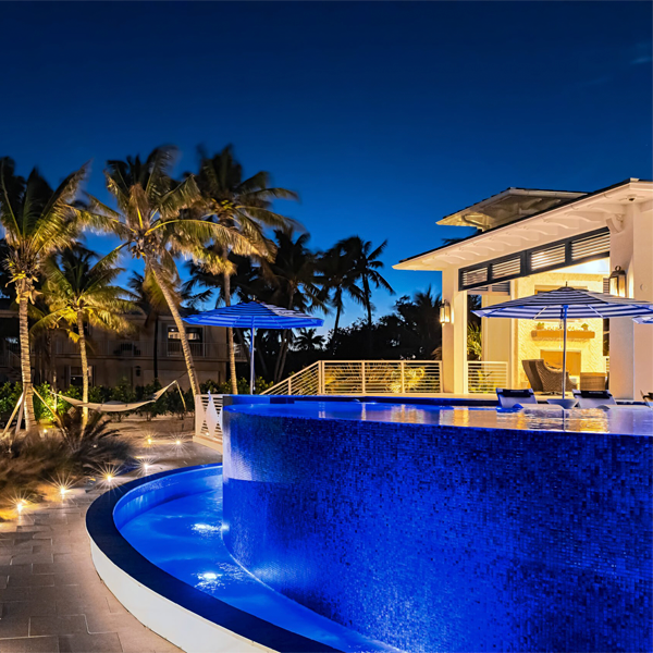 lighted custom infinity pool with spa by D´Asign Source