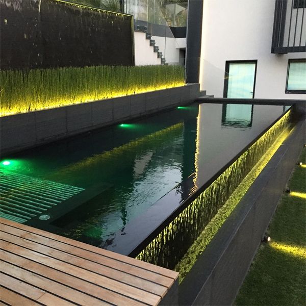Lighted infinity pool spa, by Acquawell Piscine