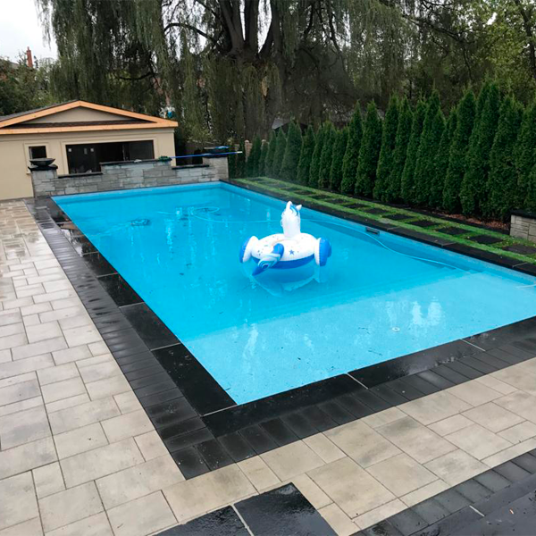 blue pool and dark surroundings