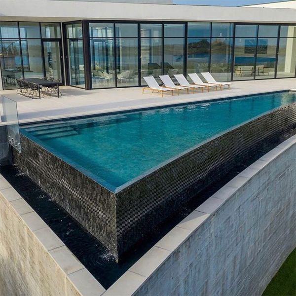 Spectacular custom infinity pool, in a luxurious modern design house, by DRPILLA