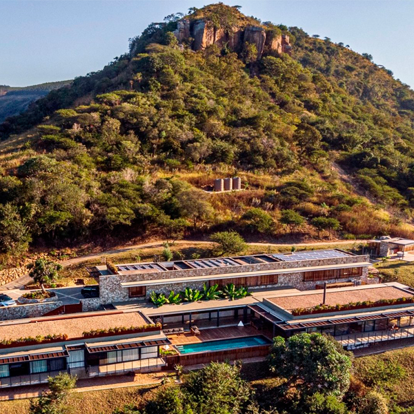 modern house in a hill with a lap infinity pool by Elphick Proome Architecture