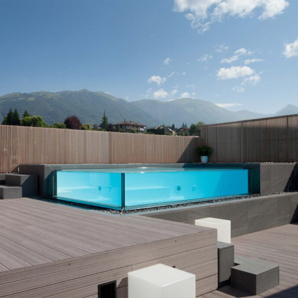 above ground transparent infinity pool in a rooftop by Teknopiscine