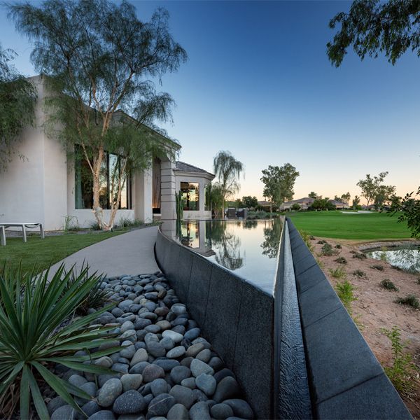 custom infinity pool and spa by Liquid Evolution Pools