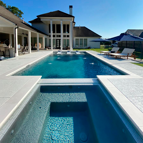 pool, spa and landscaping by Makaira Landscape Pools