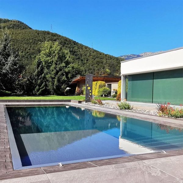 prefab swimming pool in a project of landscaping by Lattion Veillard