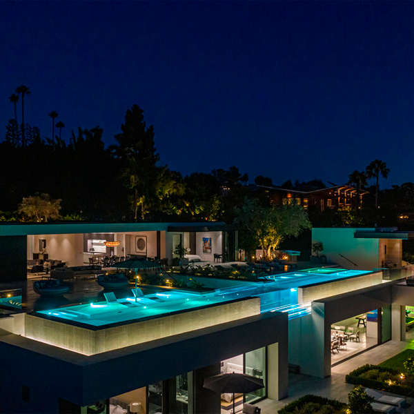 suspended transparent pool by Lynda Murray at night