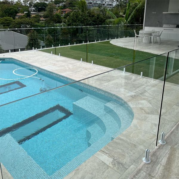 private custom pool with underwater windows in the floor, by Dreamscape Pools and Landscaping