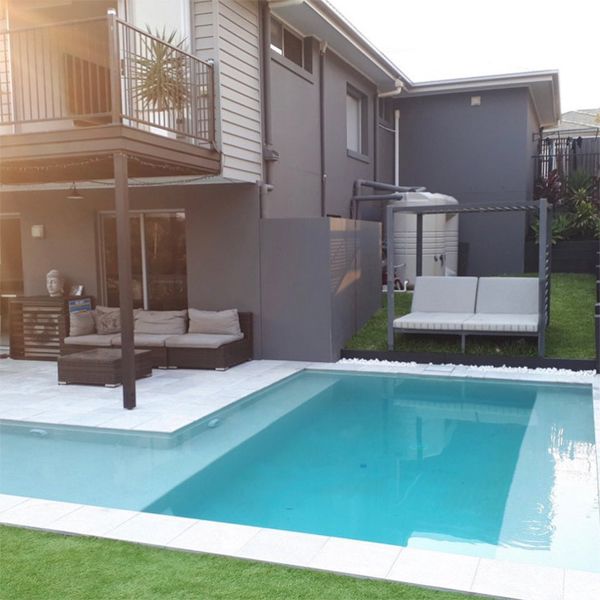 private pool in a small patio by Gold Coast Family Pools