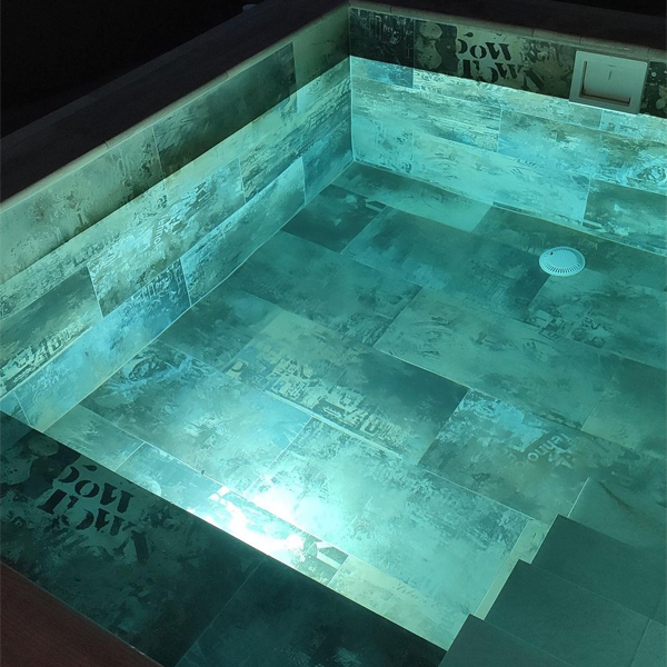 mini pool at night by Aqua Piscines