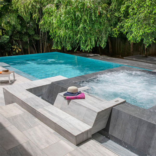 overflow pool and spa by Joan Roca Master Pool Designs