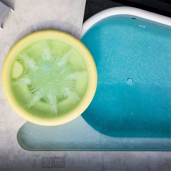 drone view of a unique custom pool with a yellow spa, by Enki Pools