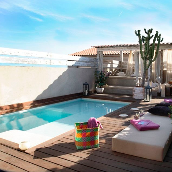mini pool in a small backyard by PC Pools