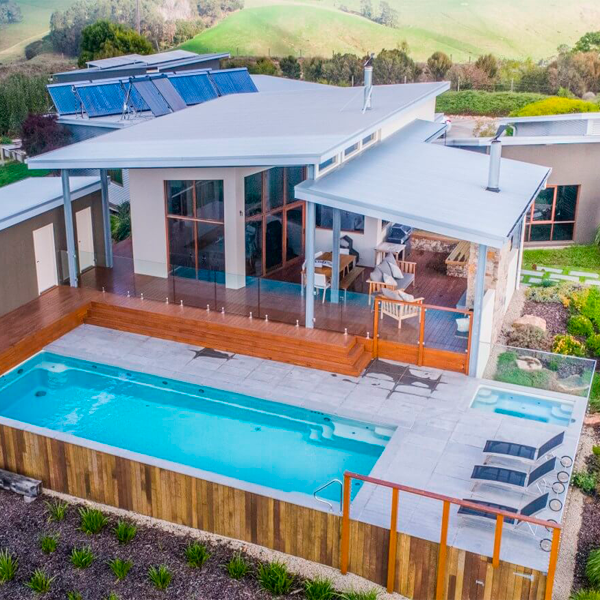above ground pool surrounded by wood