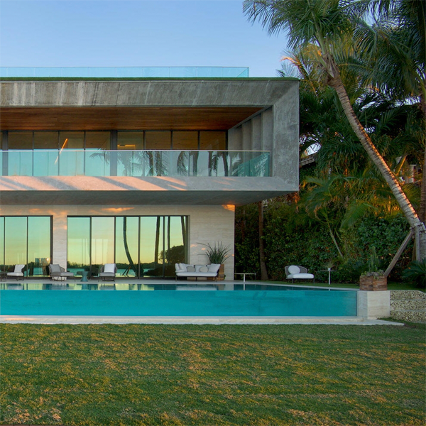 infinity transparent pool at sunset by Oppenheim Architecture