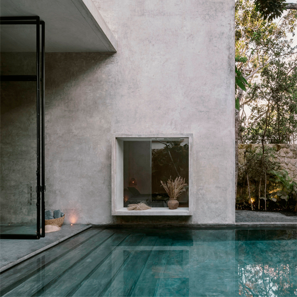overflow pool just from the sitting room by Co-Lab