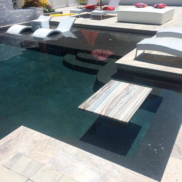 black custom pool by New Wave Pools