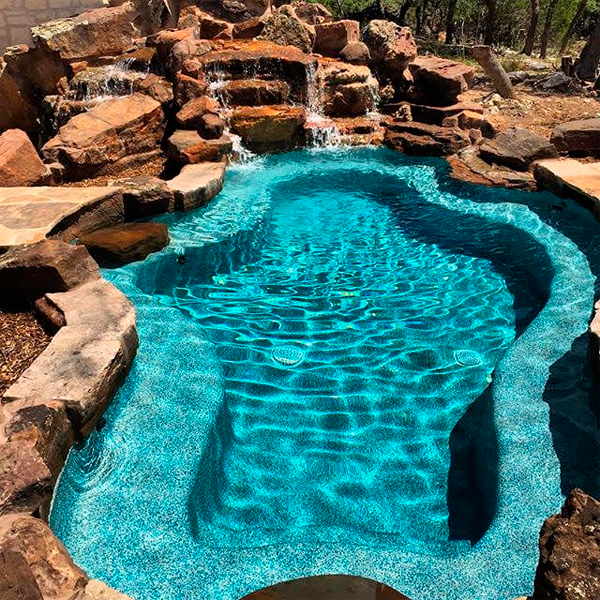 unique pool by Fossil Creek Pools