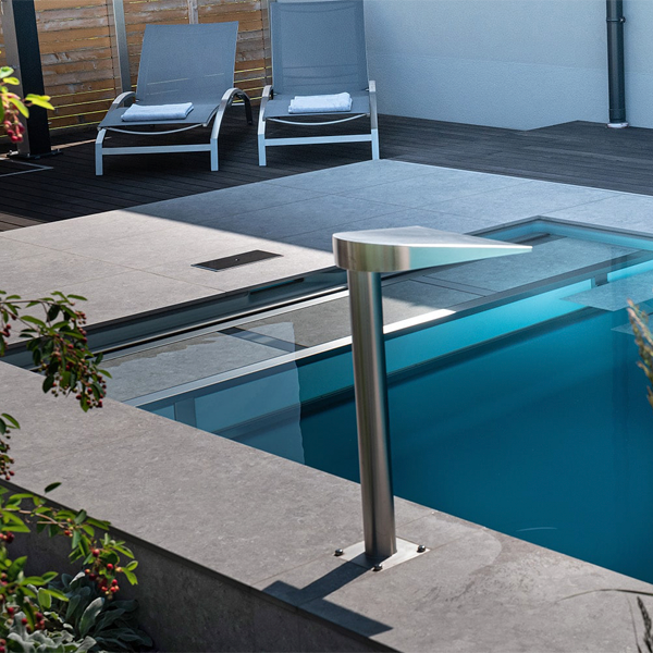 private pool with an inox waterfall by Leidenfrost