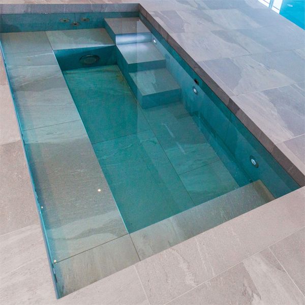 private spa in a indoor pool project, by London Swimming Pools