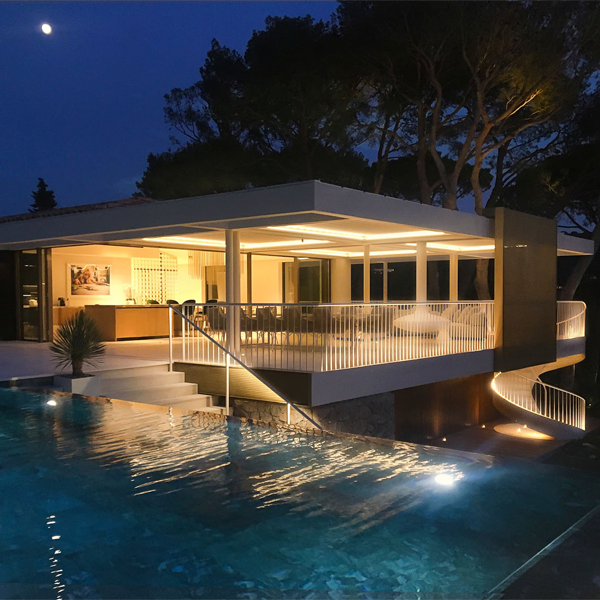 infinity lap pool in Saint Tropez at night by Vincent Coste