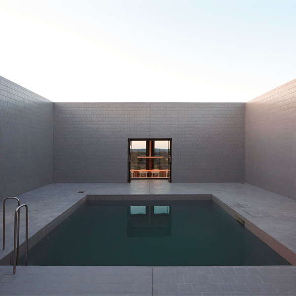 minimalist pool with an underwater window by PEZO VON ELLRICHSHAUSEN