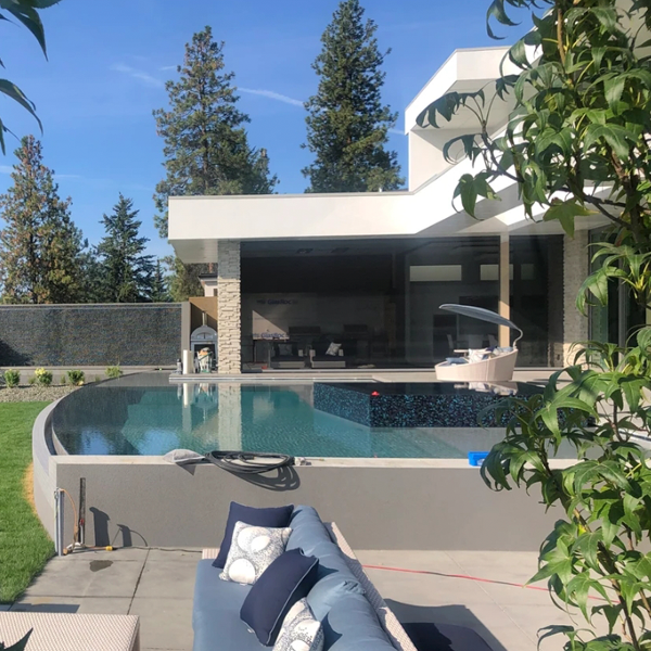 pool with an integrated spa, by Serenity Pools