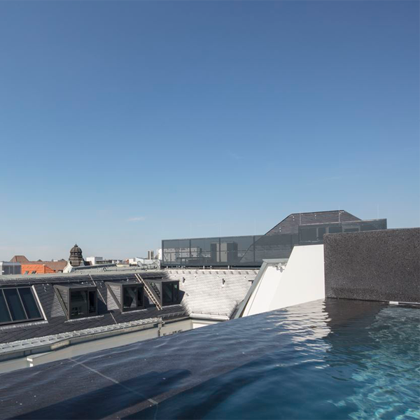 view from a black infinity pool in a rooftop