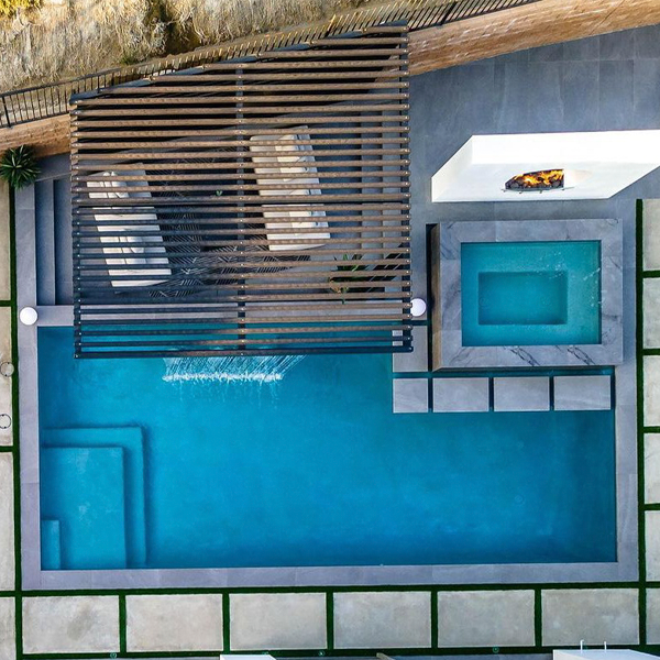 private pool and spa drone view by Westmod Design