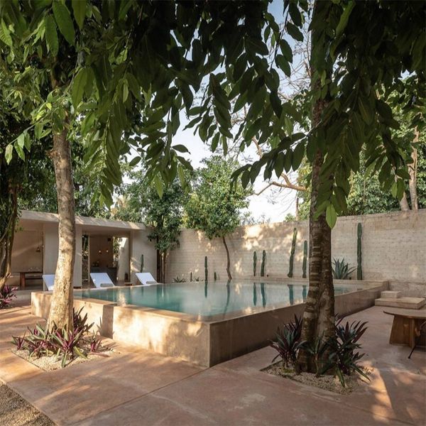 elegant infinity pool in a chic boutique hotel project by Collectif Como
