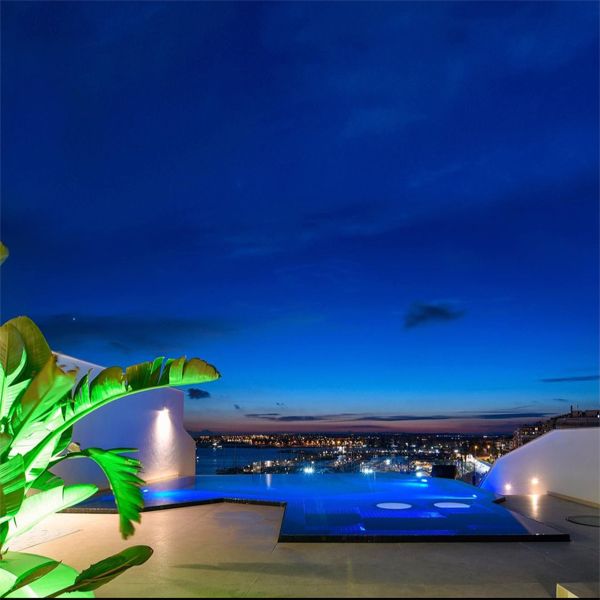 mini infinity pool spa, at sunset, by Gunitec Pools