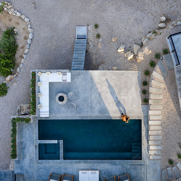 private pool and spa drone view by Roca Arquitectos