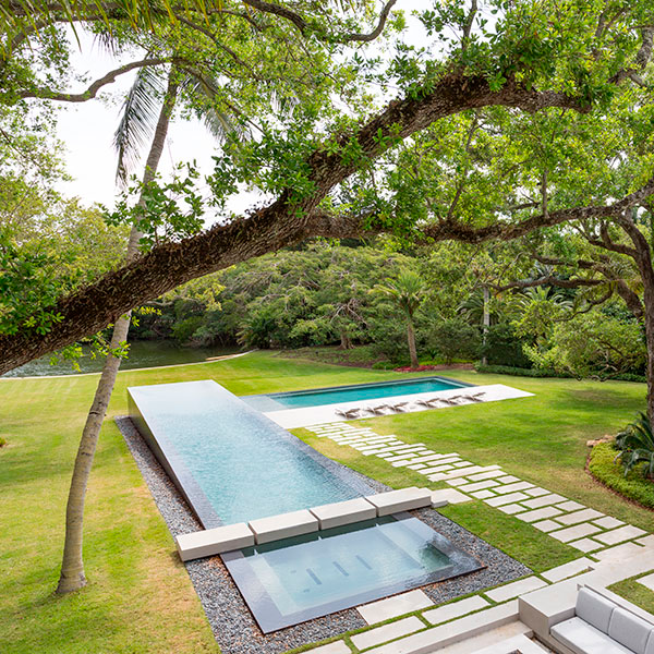 two infinity pools together, by Pool Tech of Miami
