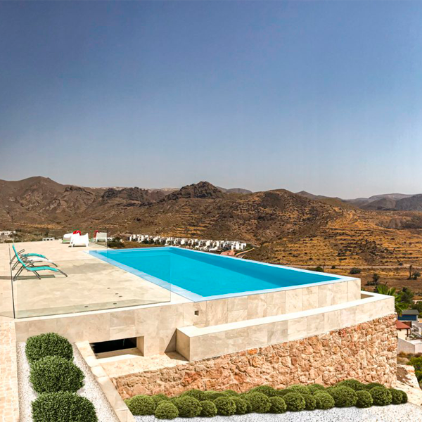 infinity pool in a top hill by Indalpool