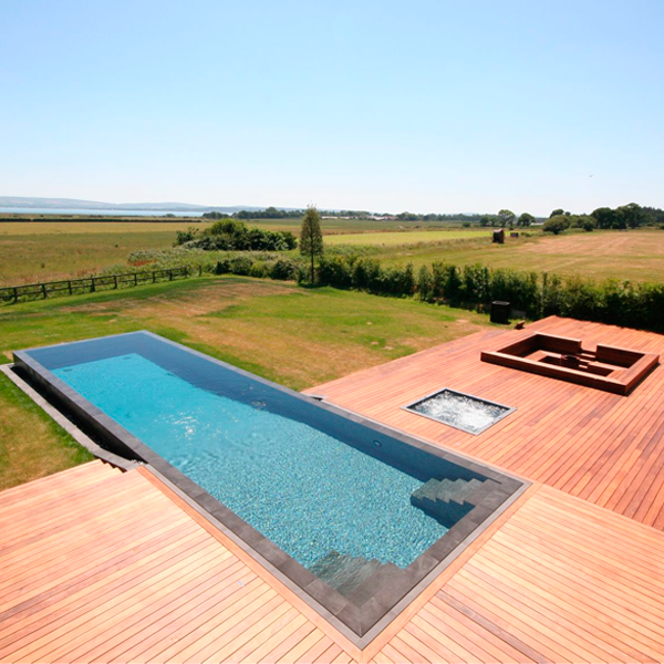 rectangular overflow pool in the middle of the field
