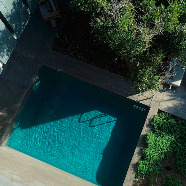 minimalist mini pool in a project by Gavin Maddock