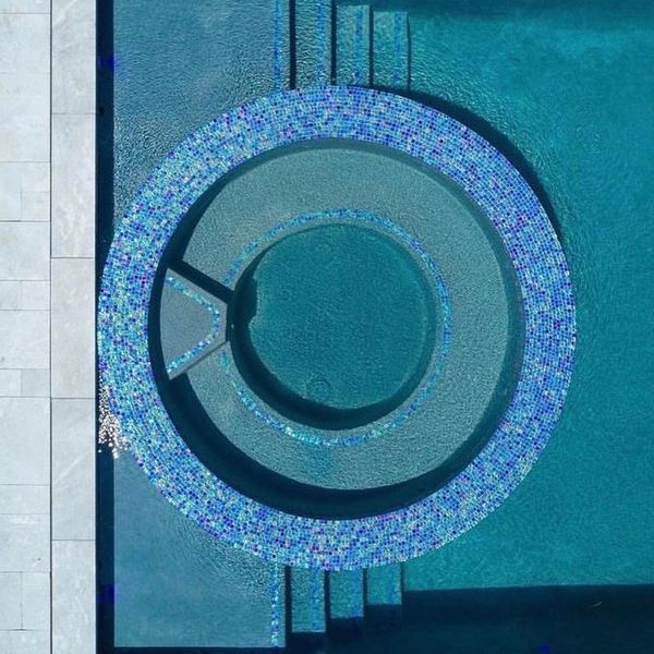 drone view of a spa in a private pool by Sj Pools and Landscaping
