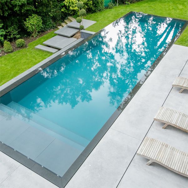 modern infinity pool in a landscaping project by Peguet Paysages