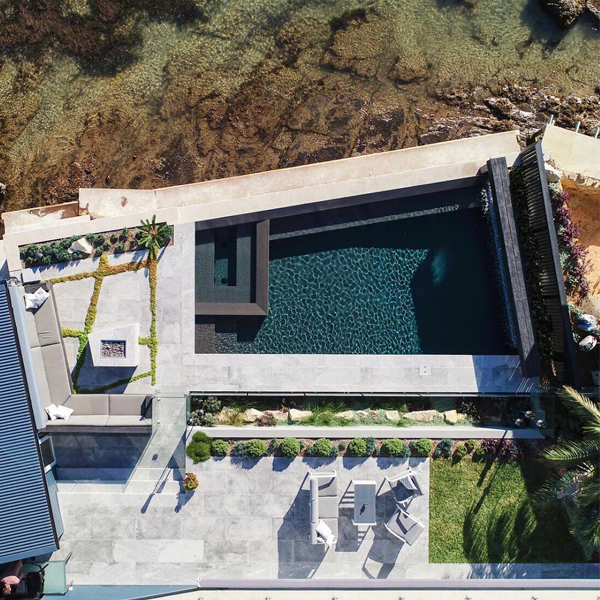 mini pool and spa drone view by A Total Concept