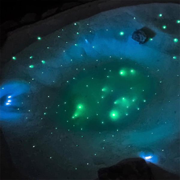 a starry sky at the bottom of a mini sand pool, by Beach Pool, using fiber optic lighting