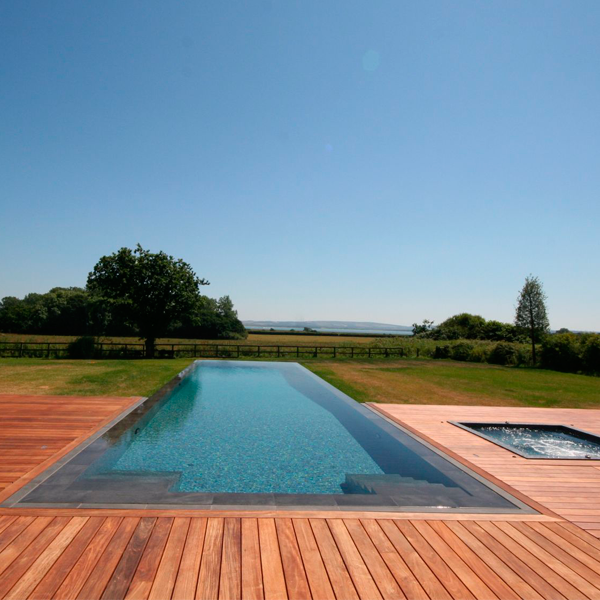 rectangular overflow pool in the middle of the field