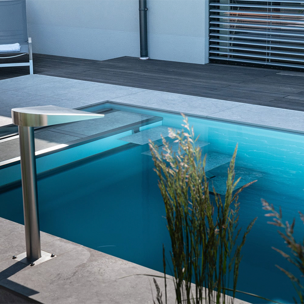 private pool with an inox waterfall by Leidenfrost