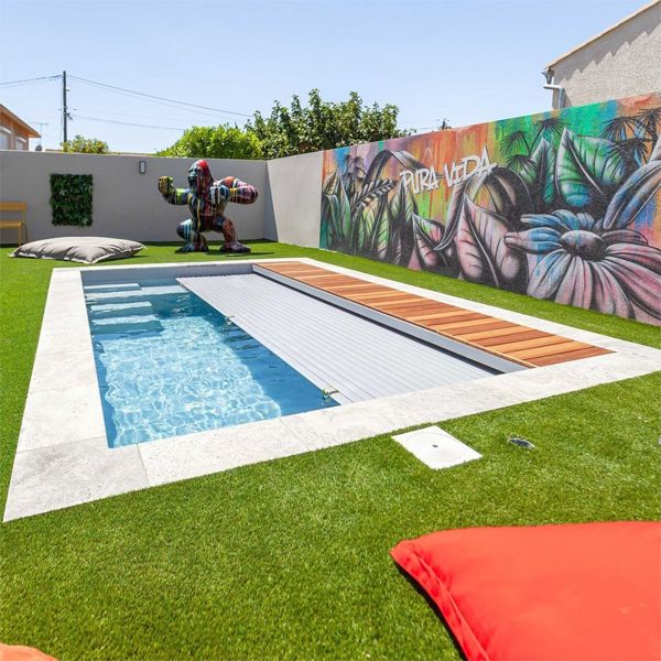 prefab mini pool with an automatic pool cover, by MCR Piscines